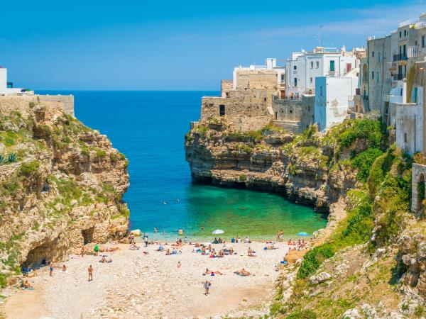 people on the beach of Polignano a Mare Lama Monachile